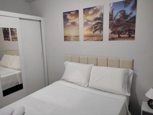 Ένα ή περισσότερα κρεβάτια σε δωμάτιο στο Apartamento La Privé-Residencial dos Lírios