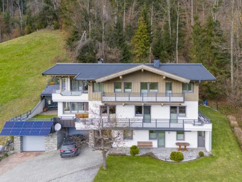an aerial view of a house with solar panels at Berg und Blüte II in Sankt Jakob in Haus