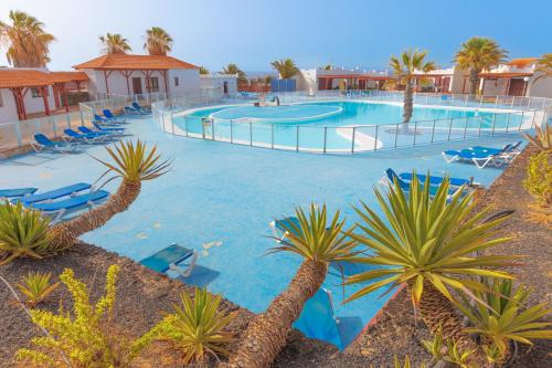 Sunny Terrace by the Pool - Relax Caleta de Fuste