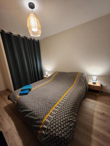 Postel nebo postele na pokoji v ubytování Appart tout confort & équipé TT