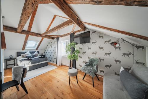 a bedroom with a bed and a wall with bats on it at Innsbruck City Chalet in Innsbruck