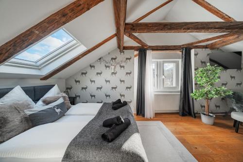 Postel nebo postele na pokoji v ubytování Innsbruck City Chalet