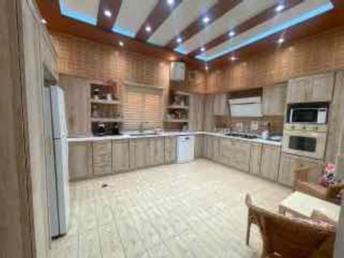 Η κουζίνα ή μικρή κουζίνα στο Beitk Al-ula Apartments شقق بيتك العلا