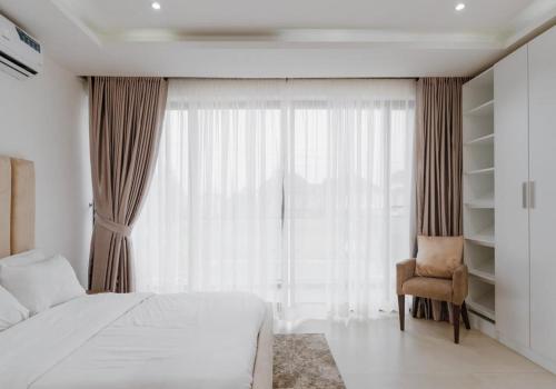 Ένα ή περισσότερα κρεβάτια σε δωμάτιο στο 3 Bed Apartment Lekki Phase 1 Lagos