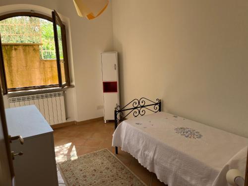 Postel nebo postele na pokoji v ubytování Camelia