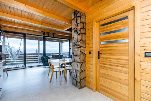 Φωτογραφία από το άλμπουμ του Domki Szlembark- widok na Tatry, jacuzzi σε Szlembark