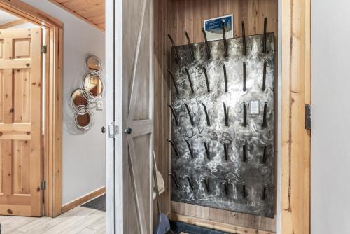 a room with a wall filled with glasses at Deer Valley Luxury 3 BR, Private Master Suite, Private Hot Tub, Amazing Views in Park City