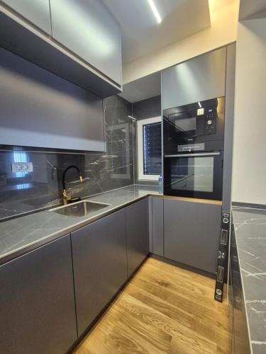 Dapur atau dapur kecil di Embla residence