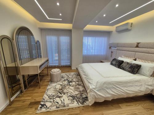 Embla residence 객실 침대