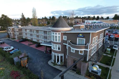 an overhead view of a building in a parking lot at Days Inn by Wyndham Surrey in Surrey