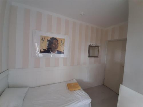 Ένα ή περισσότερα κρεβάτια σε δωμάτιο στο APARTAMENTY ZIELONY KAMELEON