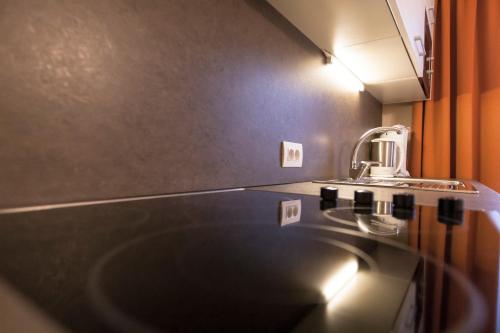 Kuchyň nebo kuchyňský kout v ubytování Apartments Schneider