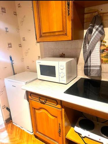 Kuchyň nebo kuchyňský kout v ubytování Nid Douillet Chalon Centre Appartement Sublime
