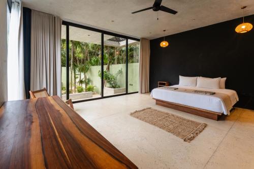 Postel nebo postele na pokoji v ubytování Vihara Tulum 5BR Tankah - Next Level
