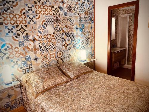 Postel nebo postele na pokoji v ubytování Apartamentos Ruz