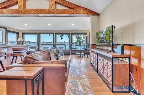 a living room with a couch and a television at Downs By The River 2 Bedrooms 1 Bathroom in Prince Frederick