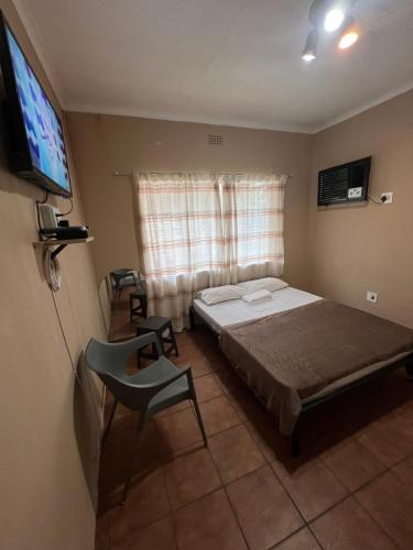 TV a/nebo společenská místnost v ubytování Happy time guest houses