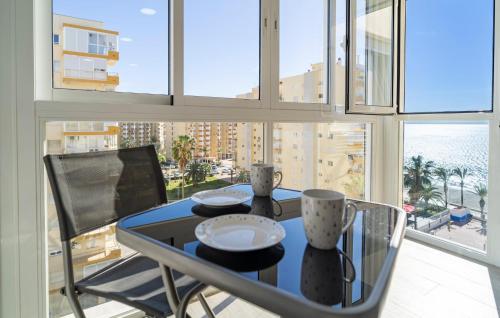 En balkon eller terrasse på Cozy Apartment In Málaga