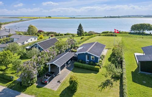 an aerial view of a house with a car parked in front at Nice Home In Odder With Wifi in Odder