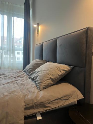 Postel nebo postele na pokoji v ubytování Apartament NP