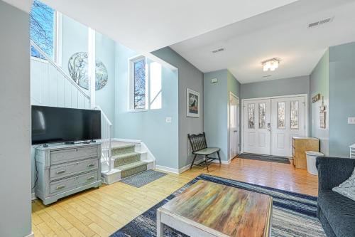 a living room with a tv and a couch at Straight to the Point in Bumpass