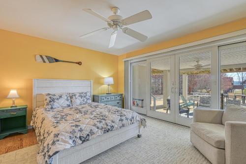 a bedroom with a bed and a ceiling fan at Straight to the Point in Bumpass