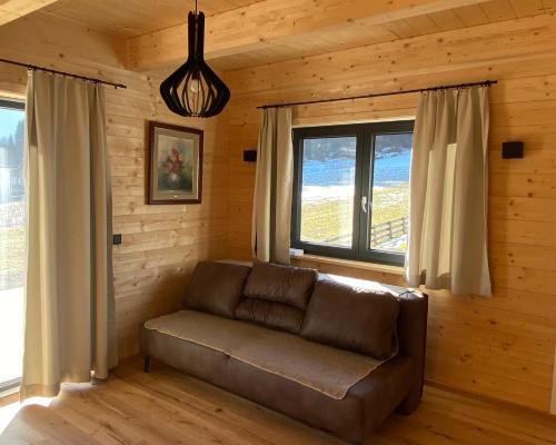 Posezení v ubytování Entspannen im Holzchalet mit Panoramablick, Ruhe und Infrarotsauna