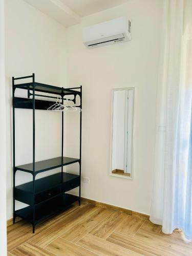 Ένα ή περισσότερα κρεβάτια σε δωμάτιο στο Guest House Levante