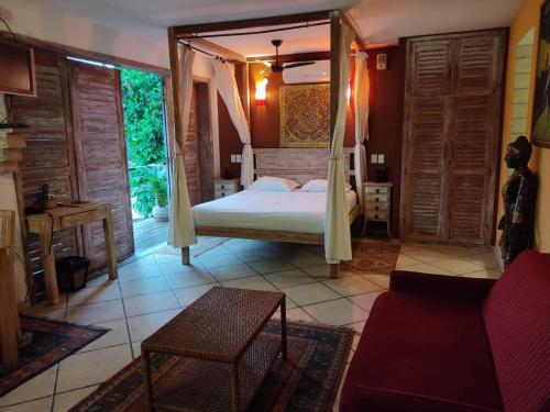 Ένα ή περισσότερα κρεβάτια σε δωμάτιο στο Gávea Sunset Residence Hotel