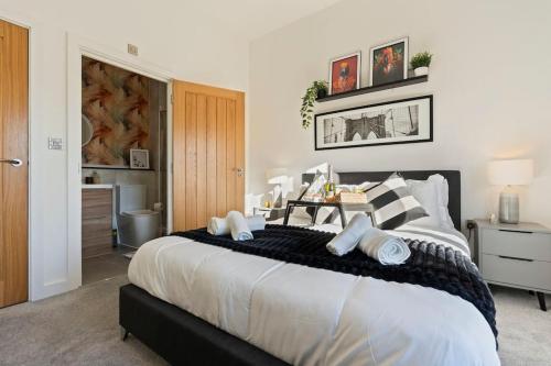 Ένα ή περισσότερα κρεβάτια σε δωμάτιο στο Luxury Apartment in JQ Sleeps 6