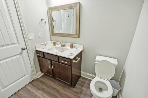 a bathroom with a sink and a toilet at Biltmore Luxury 1517 #6 Townhomes L 2bd 2 Bth in Clarksville