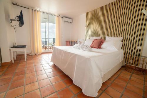 Postel nebo postele na pokoji v ubytování Appartements avec vue mer à Tartane