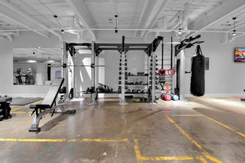 a gym with boxing equipment in a room at Industrial Loft Living 2BR 2BA in Greenville