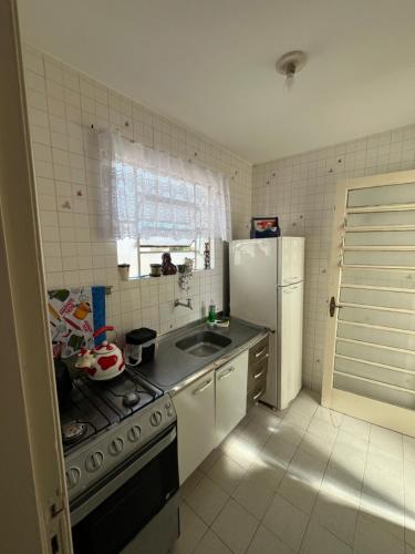 Η κουζίνα ή μικρή κουζίνα στο Loft na Rua Gonçalves Chaves