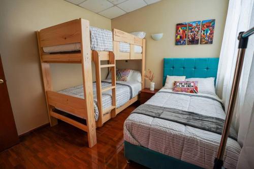 Postel nebo postele na pokoji v ubytování Sweet Home tu hogar en Cusco