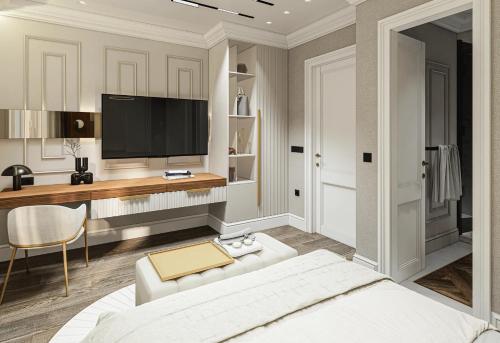 sala de estar con TV y sofá blanco en Heaven Luxury Suites, en Belgrado