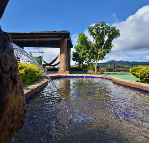 Πισίνα στο ή κοντά στο Casa campestre Finca la Roca