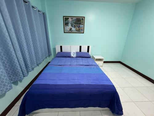 Ένα ή περισσότερα κρεβάτια σε δωμάτιο στο Best Rent a Room