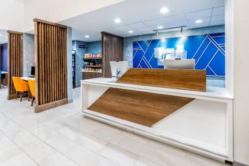 a lobby of a store with a reception desk at Holiday Inn Express Hotel & Suites Cheyenne by IHG in Cheyenne