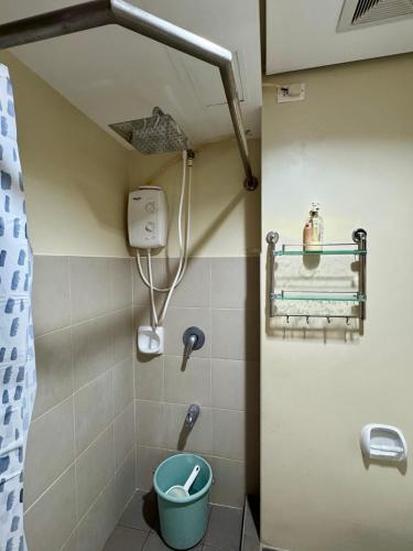 a small bathroom with a toilet in a room at Modern & Cozy Homey Condo in Avida Riala Towers Cebu City IT Park T1 in Cebu City