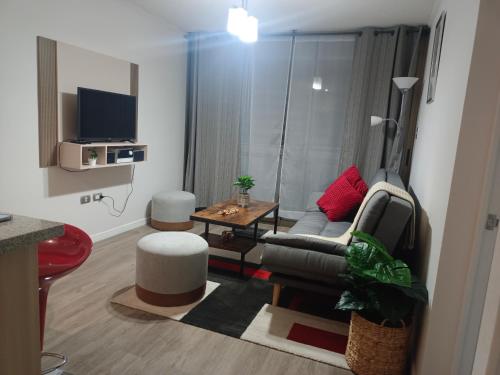 Μια τηλεόραση ή/και κέντρο ψυχαγωγίας στο Departamento Central Vista al Mar