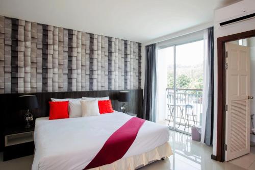 Postel nebo postele na pokoji v ubytování The Wings Boutique Hotels Krabi Ko Lanta