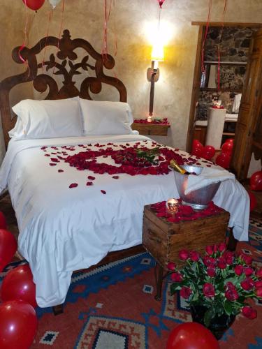 Cama o camas de una habitación en Hacienda Las Amantes