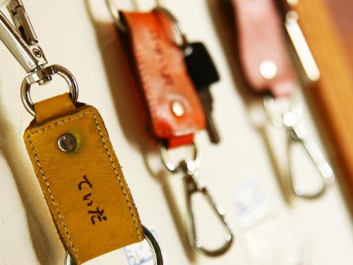 a close up of a key chain on a wall at Beach and Mountain in Ishigaki Island
