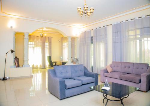 Coin salon dans l'établissement Kibagabaga Comfort stay