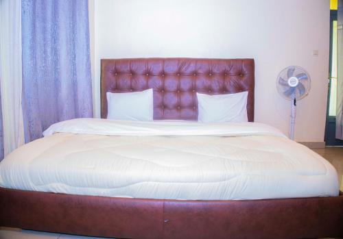Un ou plusieurs lits dans un hébergement de l'établissement Kibagabaga Comfort stay