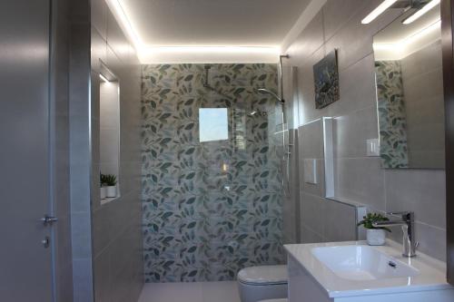 Koupelna v ubytování B&B Fili d'erba