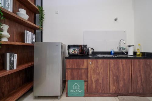 Kuchyň nebo kuchyňský kout v ubytování JOMSTAY Octagon Ipoh Suites