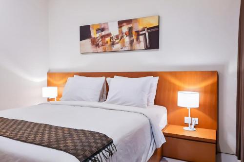Katil atau katil-katil dalam bilik di Aldan Guest House Syariah