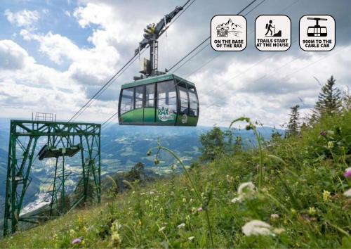 a gondola ride over a hill with a view at Herrnhof in Reichenau